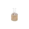 Petit vase en verre avec cannage naturel