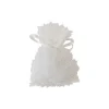 4 sachets blancs en polyester avec franges - 10 x 8 cm